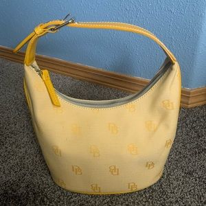 Yellow Dooney & Bourke bucket bag purse